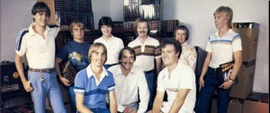 Early days in the garage at Origin. Top row, from left: Ken Arnold, Mike Ward, Laurie Thatcher, James Van Artsdalen, Helen Garriott, John Van Artsdalen. Bottom row: Richard Garriott, Robert Garriott, Chuck Bueche. 