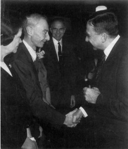 Robert Oppenheimer and Edward Teller share an uncomfortable handshake on the occasion of the former being awarded the Enrico Fermi Award, 1963.