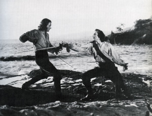 Errol Flynn duels Basil Rathbone in 1935's Captain Blood.