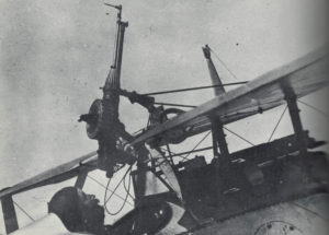 A French Nieuport biplane with machine gun mounted, less than ideally, above the pilot.