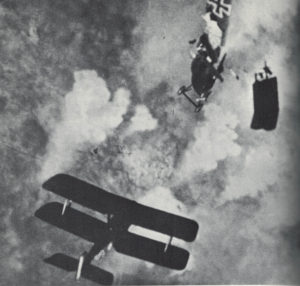 A British S.E.5a literally shoots a German Fokker to pieces.