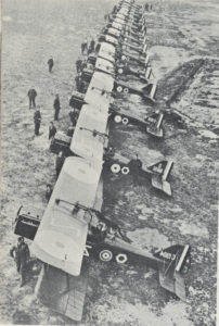 A squadron of S.E.5a scouts on the flight line.
